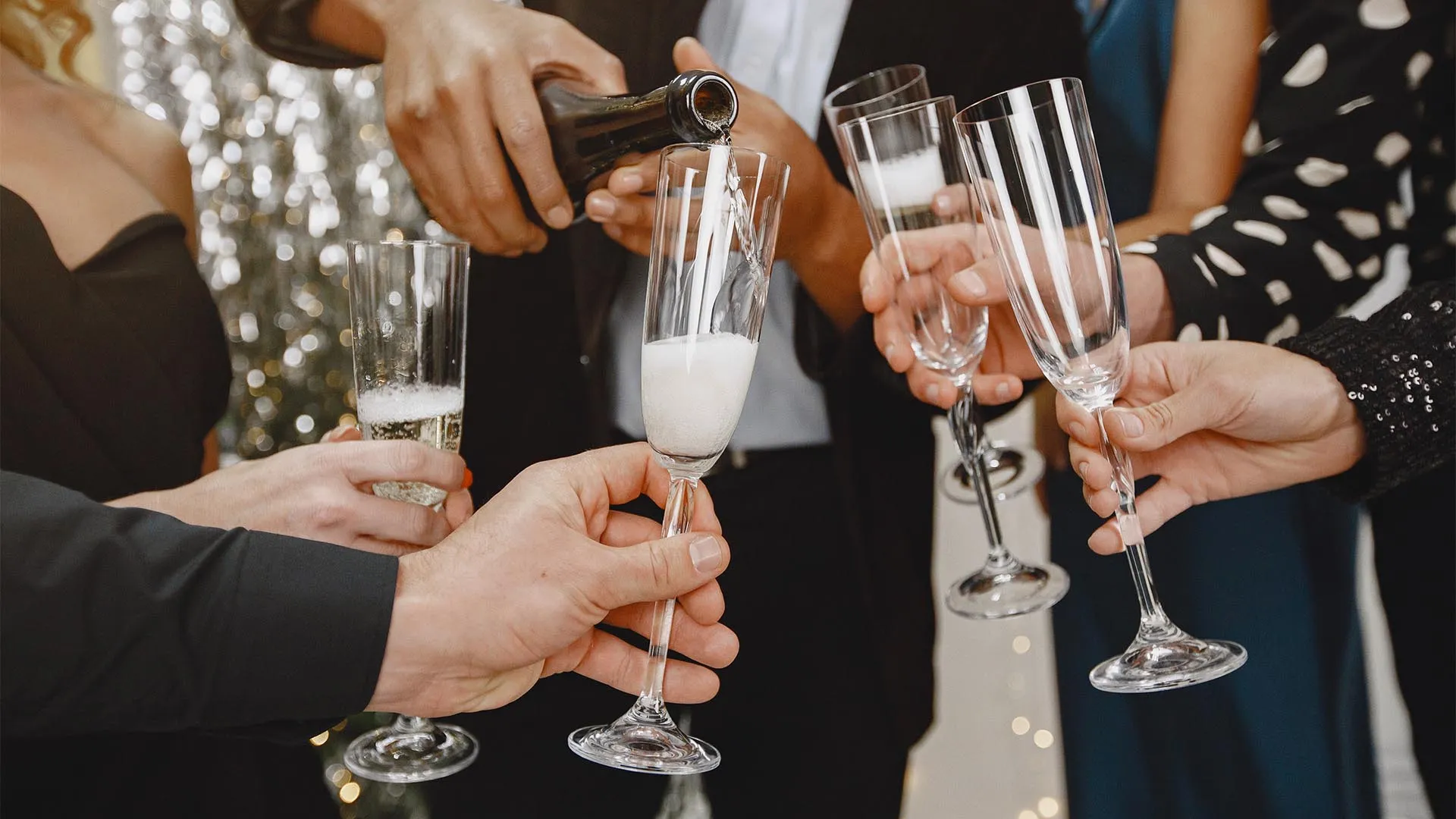 group-young-people-celebrating-new-year-friends-drinks-champagne.jpg